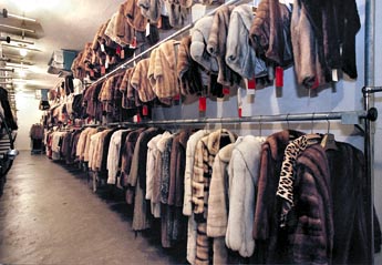 SP112695- - DELIVER TO:floridian- -11/01/2000- -st. pete- -CAPTION INFO: 3) One of the three refrigerated fur vaults at Florida Fur Cold Storage. The vaults are kept at 38 degrees with 54 percent humidity at all times. Their capacity is 15,000 garments, but presently, there are 5500 garments in storage. - -Times Photo by:CHERIE DIEZ- -Story By:Lane DeGregory- -SCANNED BY:- - RUN DATE:
